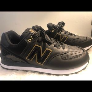 Women’s black leather New Balance Sneakers